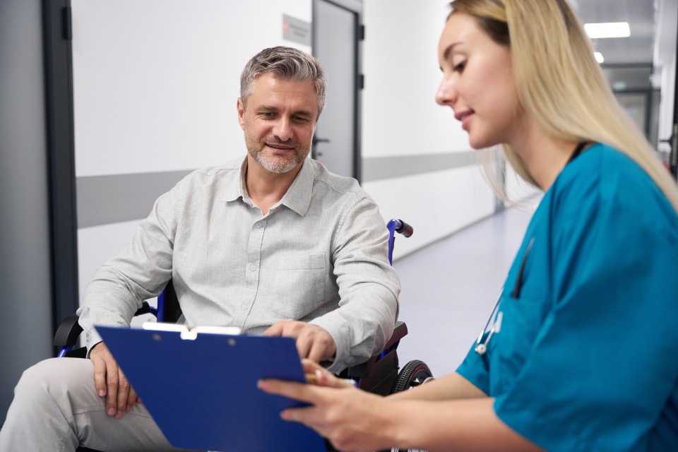 Heart failure patient speaks with health-care provider.